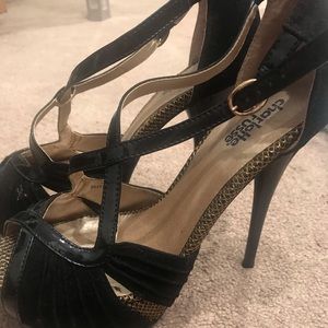 Black heels with accents of gold